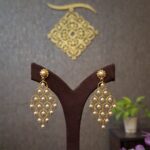 Elegant Pearl Cascade Gold Chandbali Earrings